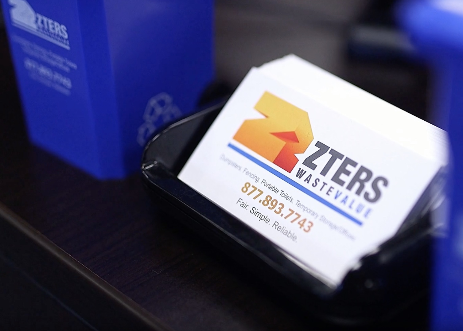 ZTERS business card with company phone number