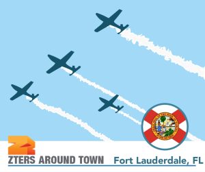 2024 fort lauderdale air show depicted by 4 jets with an air stream behind them. The Florida flag is in the bottom right.