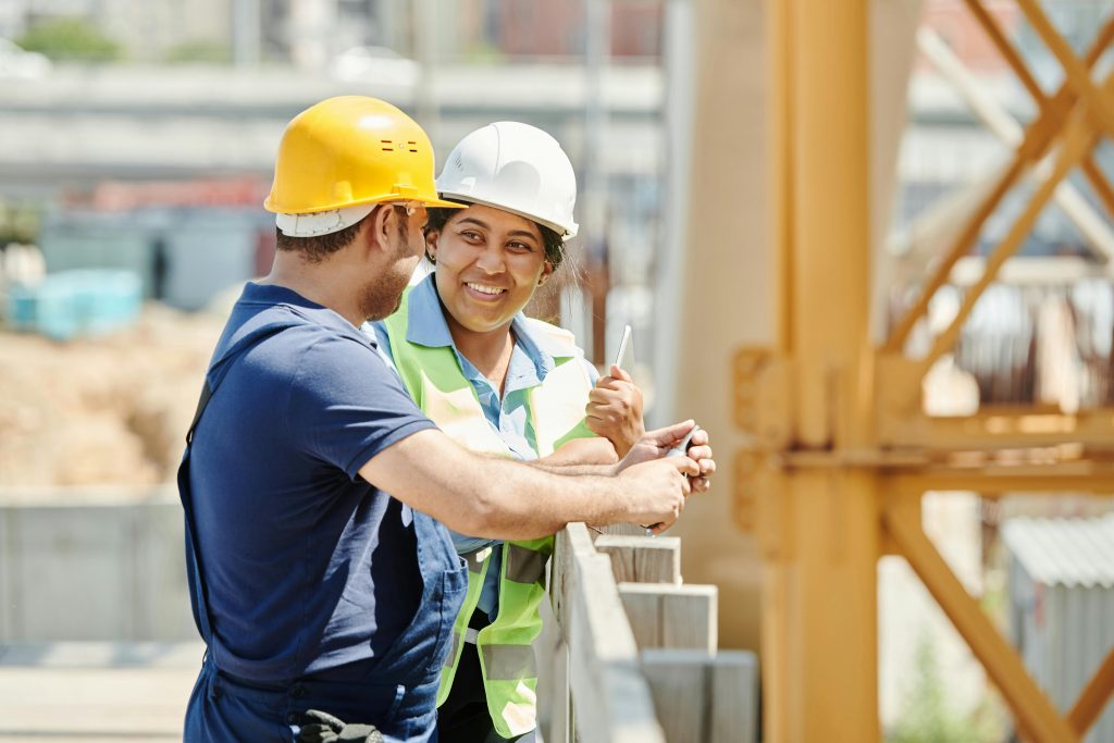 Photo of two construction workers