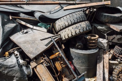 Mixed industrial scrap and discarded materials highlighting the need to optimize waste management