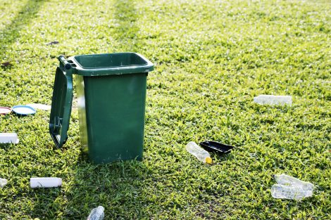 How to stop littering in your community by addressing plastic waste left near trash and recycling bins.