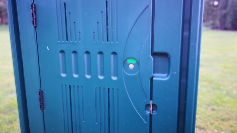 A close up picture of a porta potty